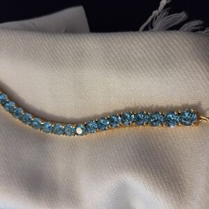 Park Lane Limited Edition Gold Tennis Bracelet with TEAL Crystal Stones